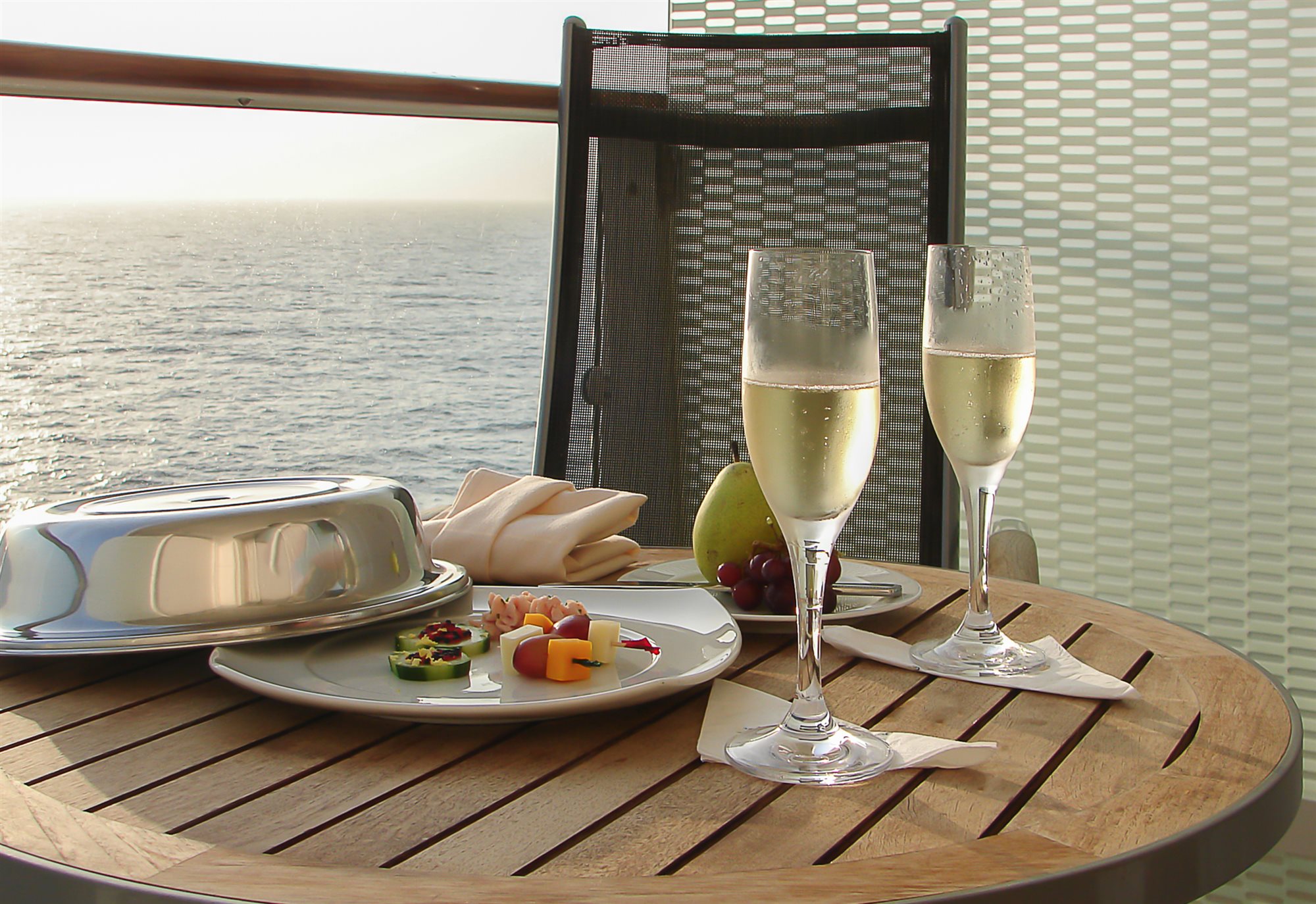 Champagne on a luxury cruise ship balcony